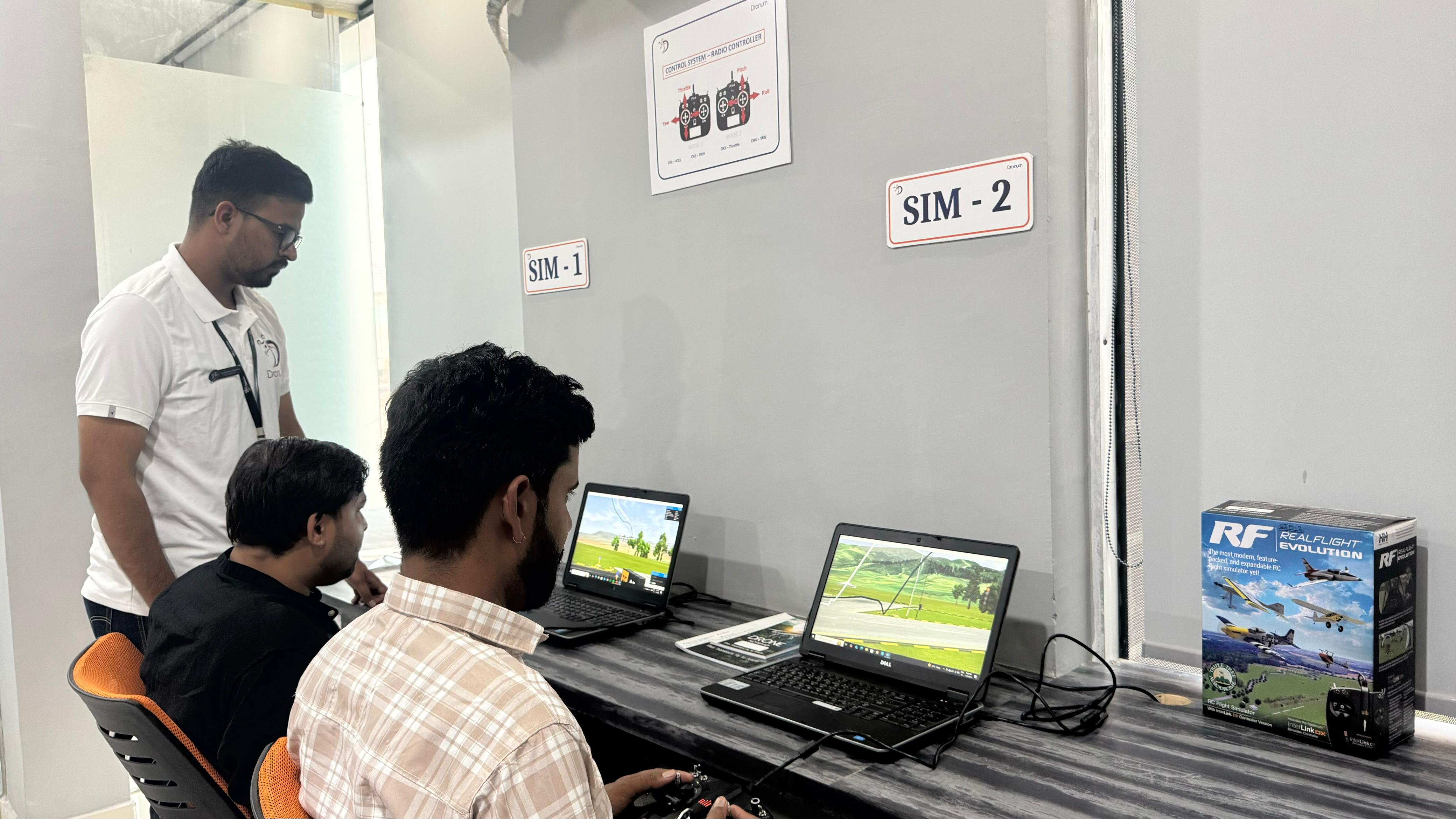 <p>Dronum India Aviation is dedicated to the development of skilled drone pilots through hands-on simulator training. The state-of-the-art simulator classes give students a realistic flying experience in a controlled environment, enabling them to practice and refine their skills. With expert trainers guiding them, students navigate complex scenarios, enhance their flight techniques, and gain mastery in drone operations with confidence. This training ensures that they are well prepared for the real world. The interactive sessions, coupled with advanced tools, enable our students to achieve precision, safety, and excellence in every flight.</p>
